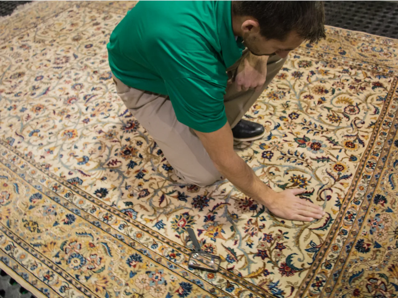 Chem-Dry technician cleaning a patterned area rug