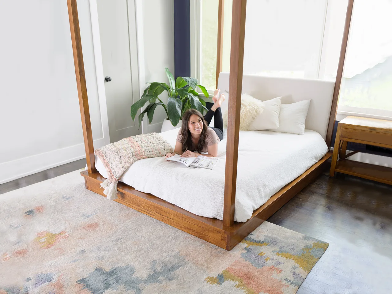 A clean, fresh mattress in a bright bedroom